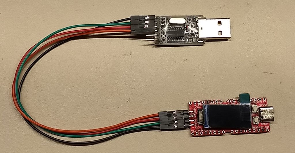 Coonect the USB-TTL adapter to the Sipeed Longan Nano using four jumpers